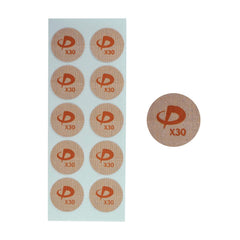 Phiten X30 titanium power tape discs on arm provide precise muscle support