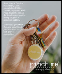 Pinch Me Locket worn as a necklace for on-the-go grounding.