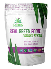 PINES Real.Green.Food powder in a jar, ready for smoothie prep and daily greens.