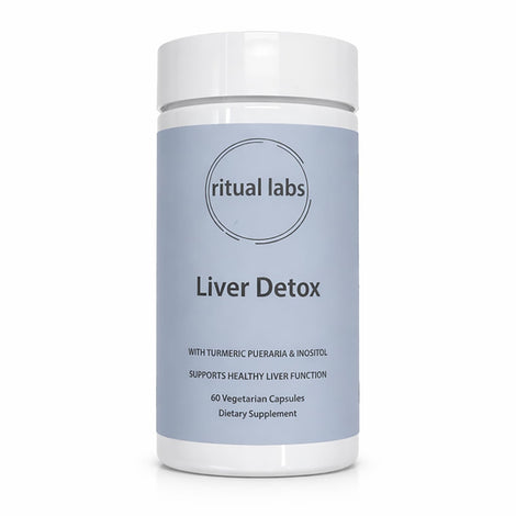 Piuregn Ritual Labs bottle on kitchen counter for daily liver wellness.
