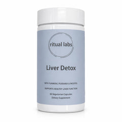 Piuregn Ritual Labs bottle on kitchen counter for daily liver wellness.