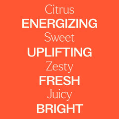 Plant Therapy Blood Orange bottle with massage setup, suggesting a mood-boosting aromatherapy ritual.