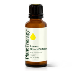 Plant Therapy lemon oil bottle with pour enhances air freshness and spaces.