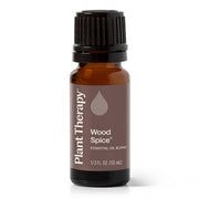 Plant Therapy Wood Spice bottle pour, warm aroma for cozy spaces.