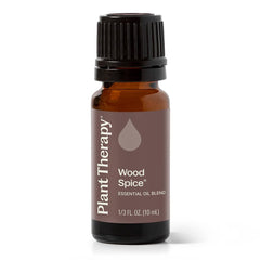 Plant Therapy Wood Spice bottle pour, warm aroma for cozy spaces.