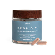 Plexus ProBio 5 bottle on kitchen counter for daily digestive support.