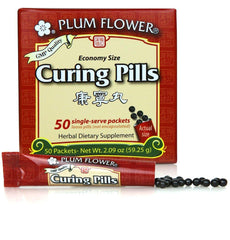 Plum Flower Kang Ning Wan curing pills in stick-pak packaging for easy daily use.