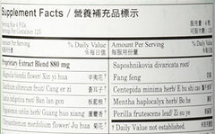 Close-up of Plum Flower Pe Min Kan Wan label showing the traditional formula