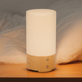 Polorden 670nm red light therapy lamp shown on a nightstand for calming evenings
