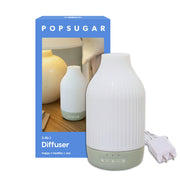 POPSUGAR 3-in-1 diffuser ambient light on bedside table for calm evenings.