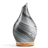Porseme ink diffuser glass globe highlighting handmade artistry and calm ambience