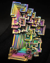 Pounique bismuth crystal triangular structure sparks study and collection.