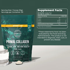 Primal Harvest Collagen Powder scoop with powder beside the canister for easy daily serving