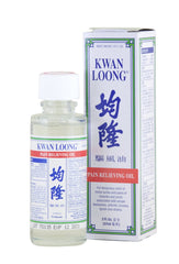 Applying Prince Of Peace Kwan Loong Oil to shoulder