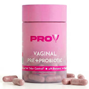 Pro-V Health bottle on table with capsules for daily feminine wellness