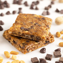 PROBAR Meal Bar ingredients close-up highlights oats, nuts, and seeds for wholesome nutrition