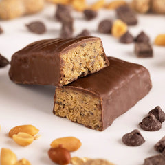 PROBAR bar close-up highlighting plant-based protein and flax seeds.