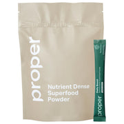 Proper front packaging showing apple-flavored greens and servings benefit