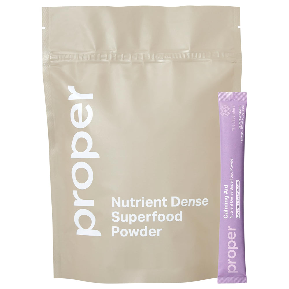 Proper Lavender Calming Aid powder in bottle promotes daily relaxation.