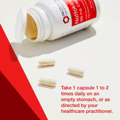Open nattokinase bottle with capsules ready for daily routine
