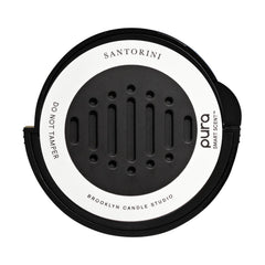 Pura Santorini car refill bottle shown for easy, lasting fragrance on the go.