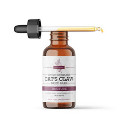 Pura Herba Cat's Claw extract poured into water for easy use.
