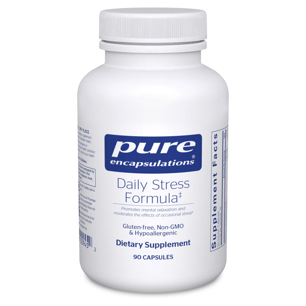 Pure Encapsulations Daily Stress Formula bottle on a desk for calm daily use.