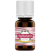 Pure Gold Spikenard Oil bottle close-up for seasonal aromatherapy