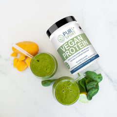 PURE Sport Vegan Protein powder swirled in blender bottle during workout
