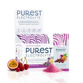 Purest Electrolyte passion cherry bottle pouring for fast hydration during workouts