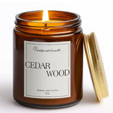 Putart Cedar Wood Candle in an amber jar enhances cozy spaces with long-lasting fragrance.