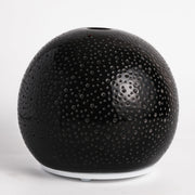 QCYBDGLOV ceramic diffuser front view enhances room ambiance with a gentle aroma.