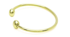 QRAY bracelet worn on wrist during activity suggesting focus and balance.