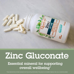 Quantum Health Zinc Gluconate 22mg bottle with glass emphasizes metabolism support