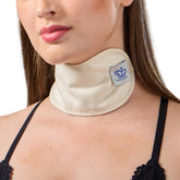 Queen of the Thrones Castor Oil Pack for Thyroid resting on the neck with heatless comfort.