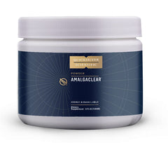 Quicksilver AmalgaClear being poured into water for convenient daily intake.