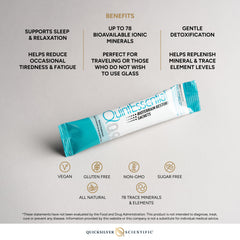 Quicksilver Scientific Quintessential 0.9 sachets poured into a glass for quick hydration
