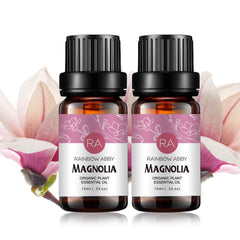 Rainbow Abby Magnolia essential oil bottle pour enhances diffuser ambiance