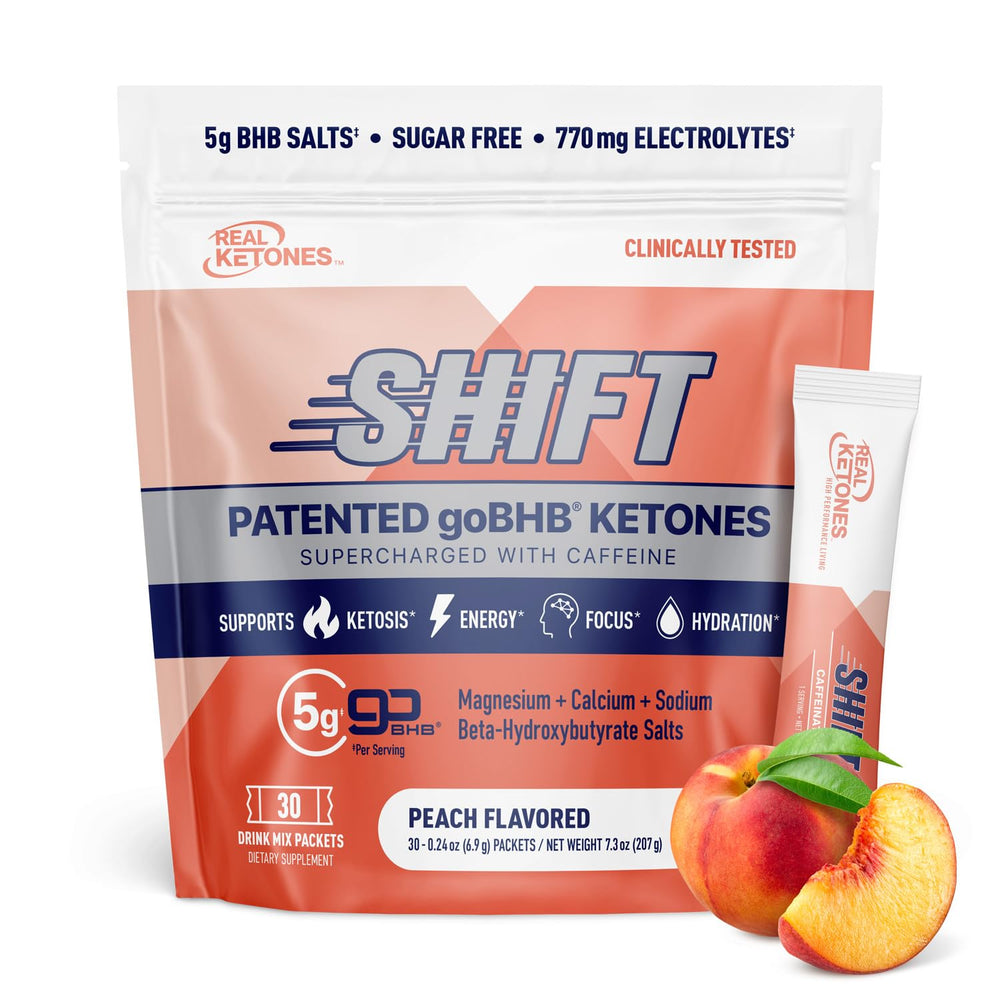 Real Ketones Peach Caffeine packet closeup for on-the-go keto energy.