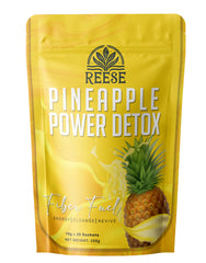 REESE Pineapple Power Detox bottle being poured for a refreshing cleanse