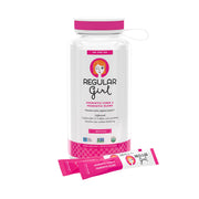 Regular Girl bottle with starter kit on counter, portable digestive support on the go.