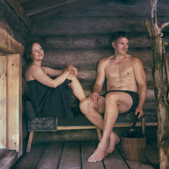 Rento Birch Sauna Scented Oil used near water releases a forest aroma.
