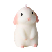 Restokki bunny candle in white with pink ears adds cozy decor and a soft glow.