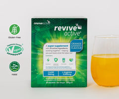 Revive Active orange flavor dissolving in water for a refreshing daily boost