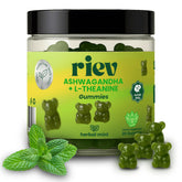 Riev Ashwagandha L-Theanine gummies bottle on desk for daily focus.