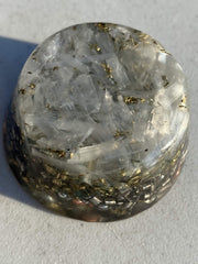Rise Perspective Selenite Orgone Generator on desk promotes calm energy for focused work.