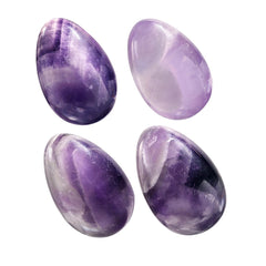 Rockcloud amethyst polished egg pocket stone closeup for calming touch and focus.