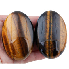 Rockcloud tiger's eye polished stone showing natural luster.