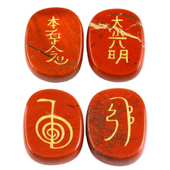 Rockcloud Red Jasper palm stones glimmer in warm light for mindful rituals.