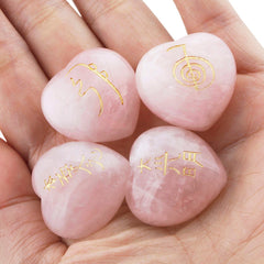 Rockcloud rose quartz heart with Reiki etchings for focus during meditation